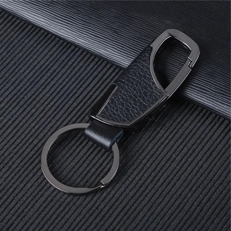 063760998676The Luxury Leather Keychain for Men combines sophisticated design with practical functionality. Featuring a sleek black clasp and high-quality leather, this keyring holder offers a touch of elegance while securely holding your keys. Its creative DIY design allows for personalization, making it a unique and thoughtful gift for any occasion.